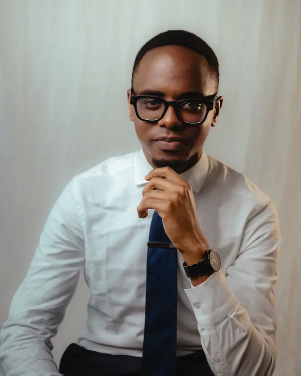 Single-light studio portrait on a seamless backdrop