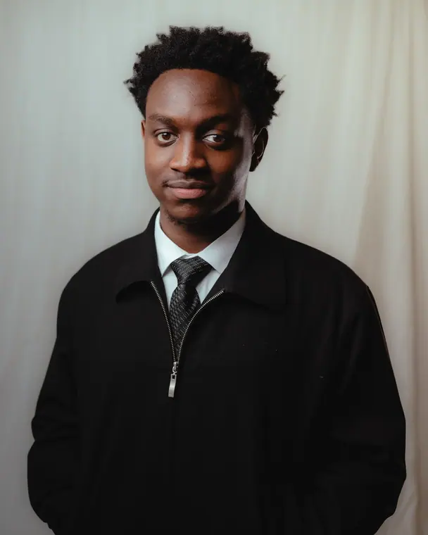 Single-light studio portrait on a seamless backdrop