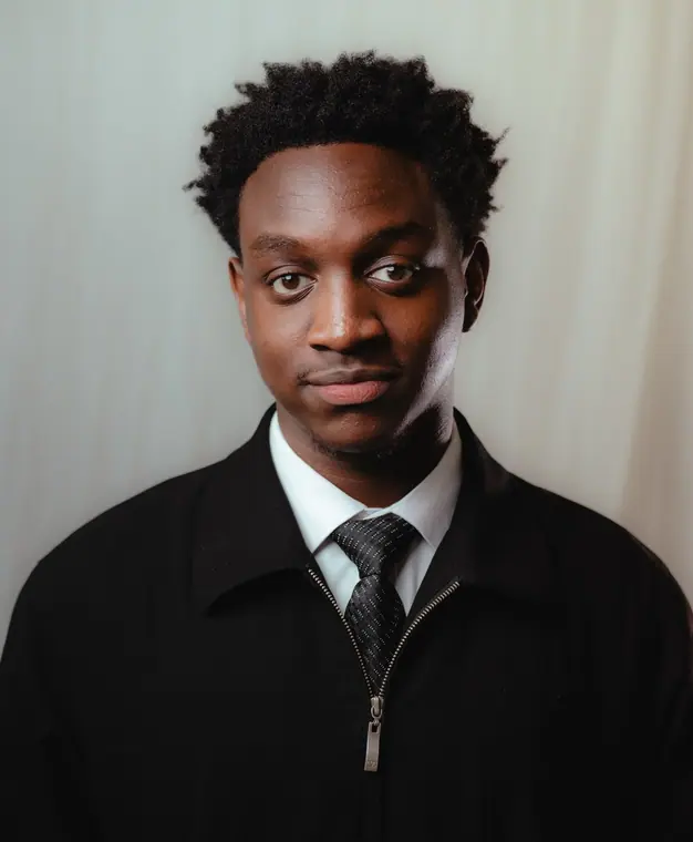 Single-light studio portrait on a seamless backdrop