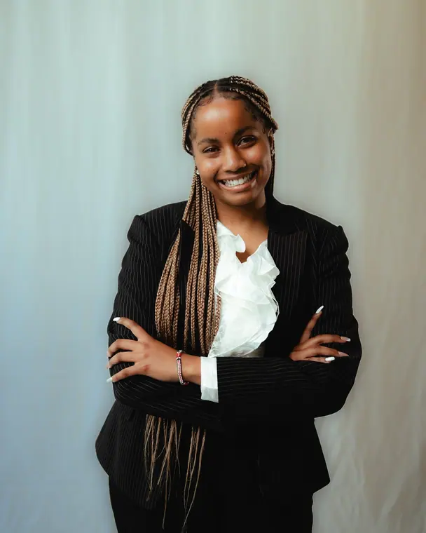 Single-light studio portrait on a seamless backdrop